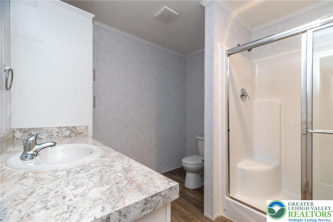 465 Royal Manor Road, Unit LOT 6 Easton, PA 18042 - Photo 21 of 25 a bathroom with a sink toilet and shower