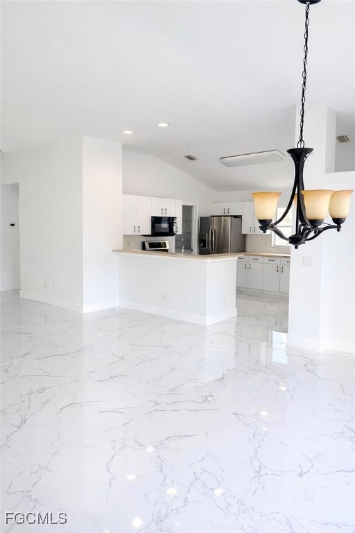 4504 Varsity Circle Lehigh Acres, FL 33971 - Photo 2 of 8 a large white kitchen with cabinets a sink and a stove
