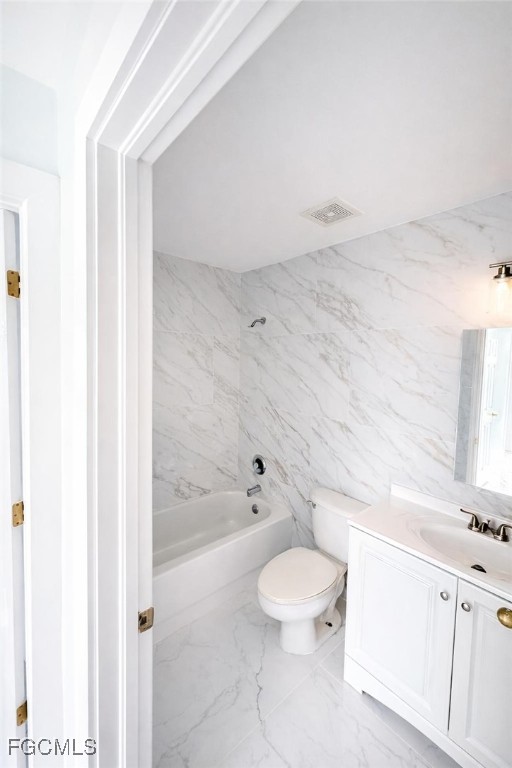 4504 Varsity Circle Lehigh Acres, FL 33971 - Photo 3 of 8 a bathroom with a toilet a sink and bathtub