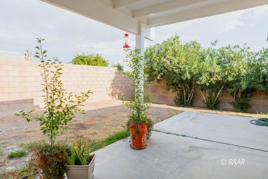 432 Ashton Street Ridgecrest, CA 93555 - Photo 28 of 31 a front view of a house with a yard