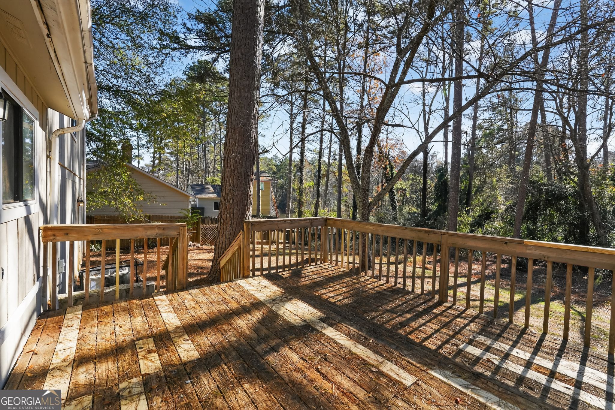 5515 Rock Springs Road Lithonia, GA 30038 - Photo 29 of 34 a view of a balcony with wooden floor