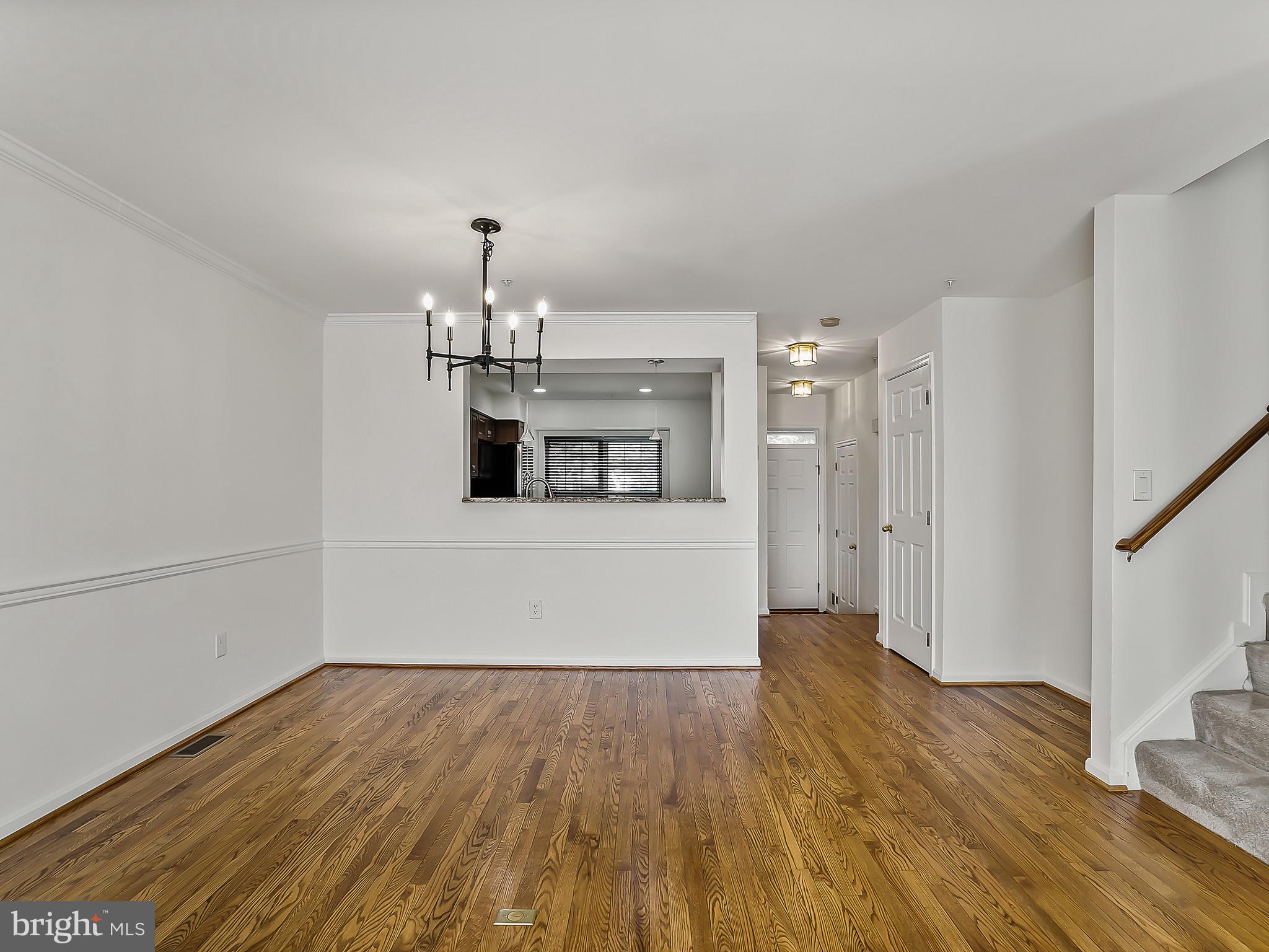 16820 Centerfield Way Olney, MD 20832 - Photo 13 of 48 Beautifully Redone Hardwood Floors in Dining Room