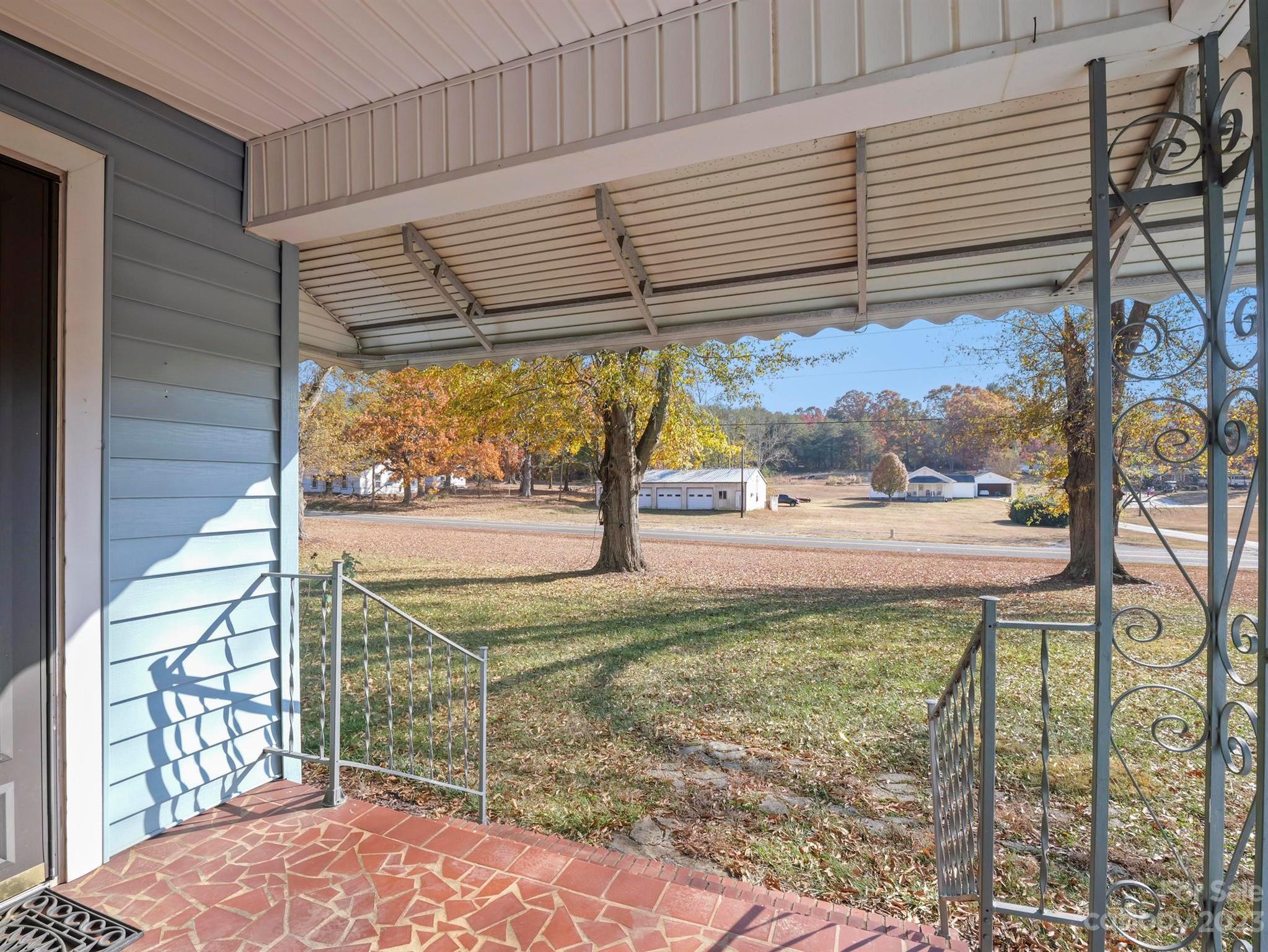 979 High Shoals Church Road Mooresboro, NC 28114 - Photo 11 of 34 a view of a porch