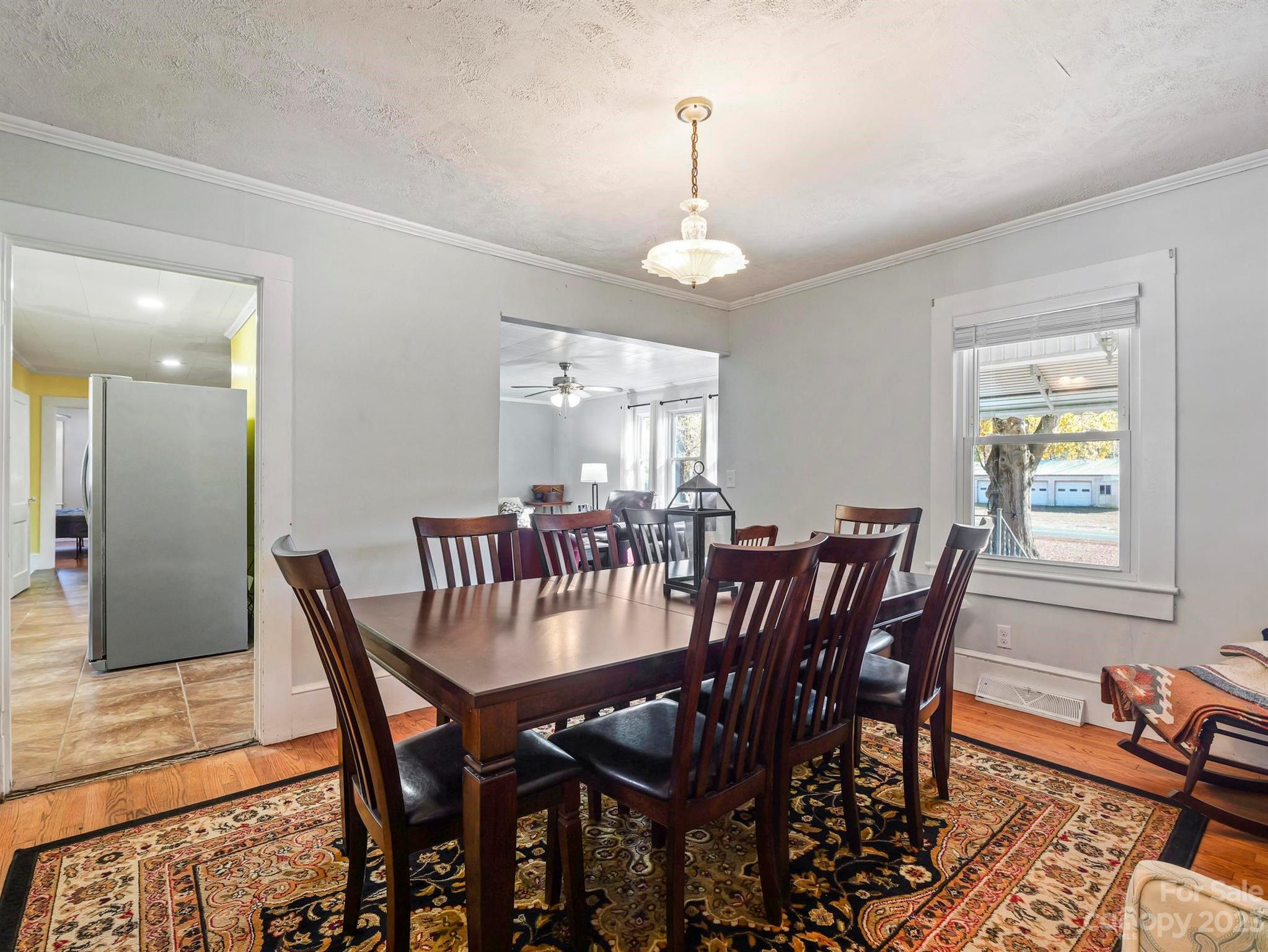 979 High Shoals Church Road Mooresboro, NC 28114 - Photo 22 of 34 a view of a dining room with furniture