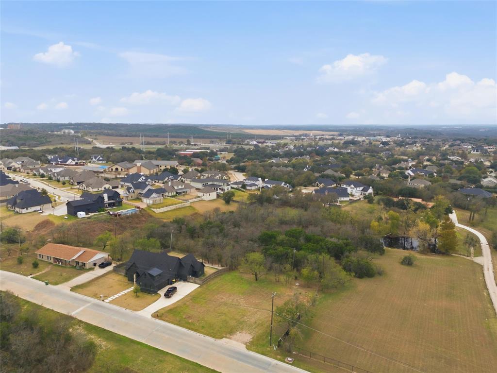 13854 Harbor Drive Woodway, TX 76712 - Photo 4 of 13 an aerial view of residential houses with outdoor space