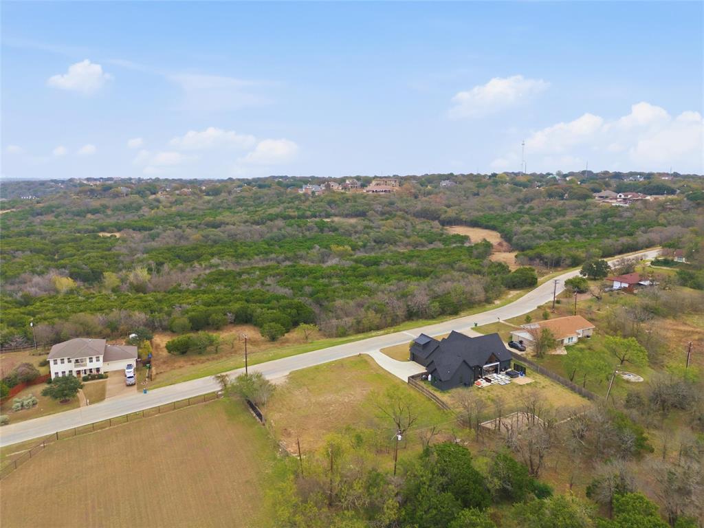 13854 Harbor Drive Woodway, TX 76712 - Photo 5 of 13 a view of a street with an ocean view