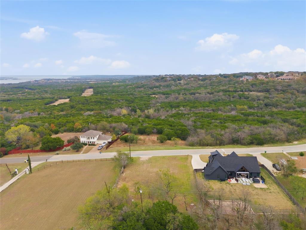 13854 Harbor Drive Woodway, TX 76712 - Photo 6 of 13 a view of a lake with a mountain