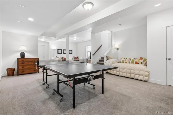 a living room with furniture and a table