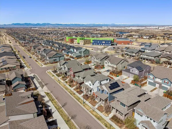an aerial view of a city with ocean view