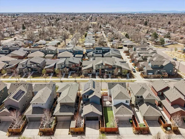 an aerial view of a chairs and table