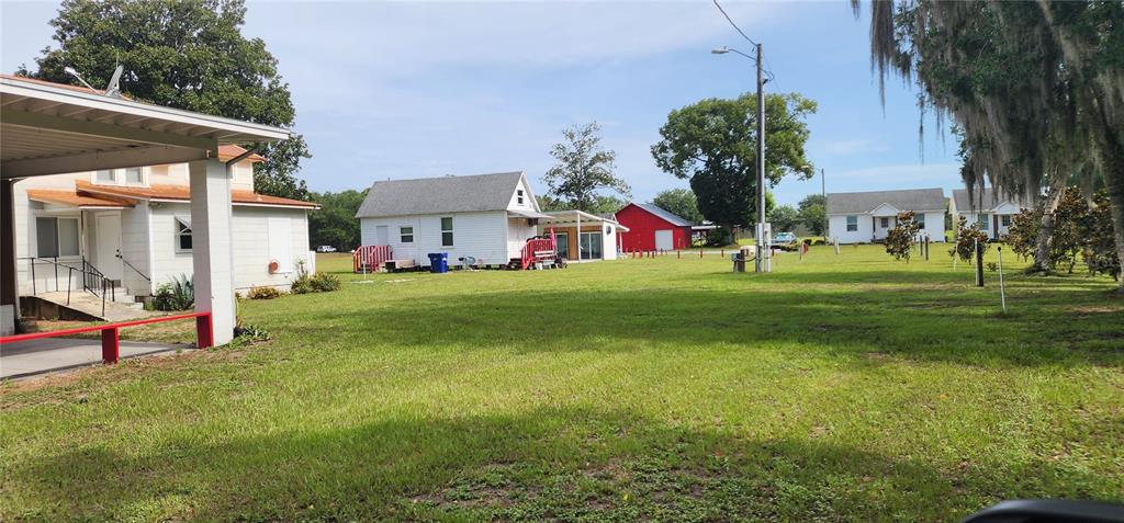 110 East 2nd Avenue Pierson, FL 32180 - Photo 5 of 11 a front view of house with yard and green space