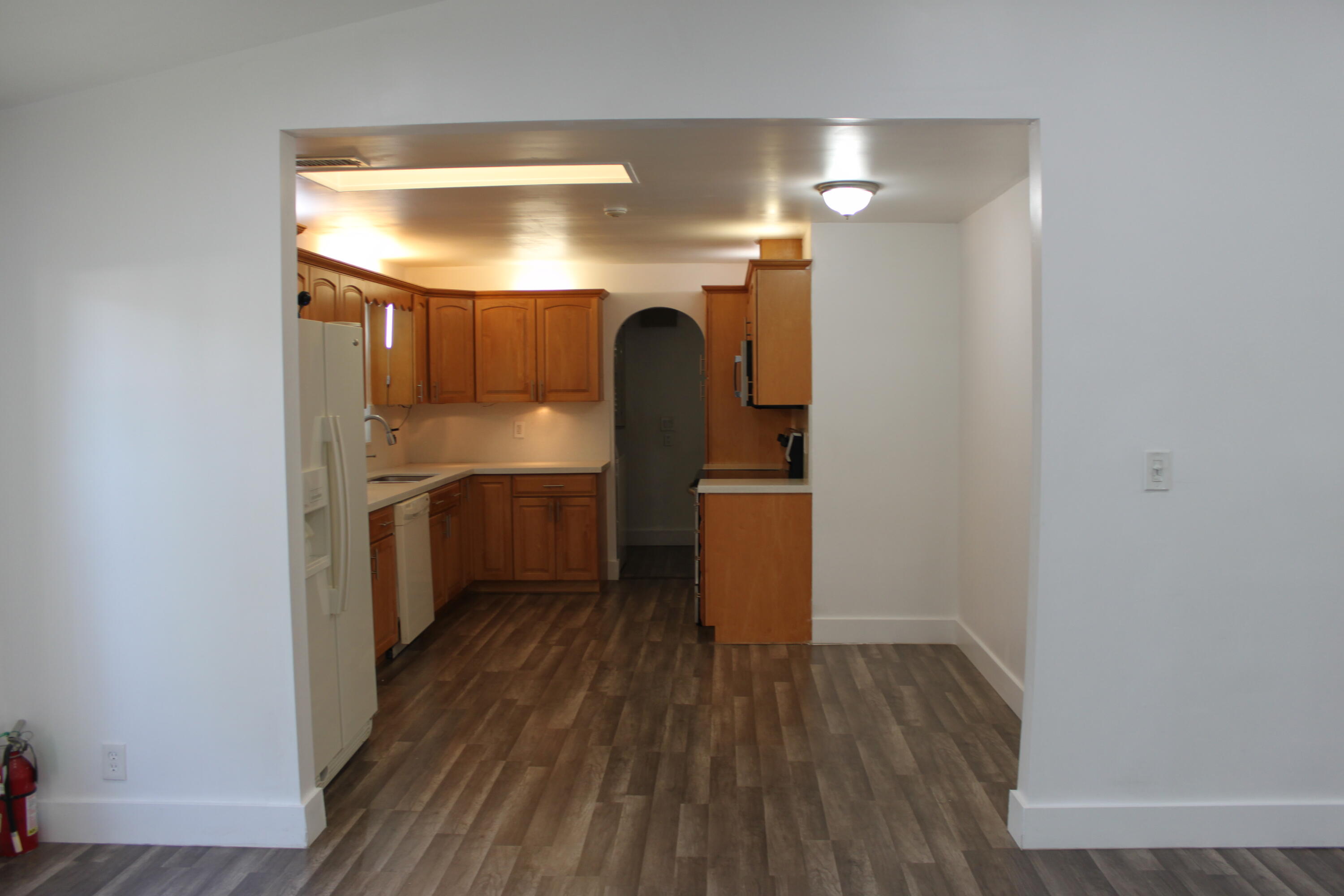 3240 Southwest 4th Street Deerfield Beach, FL 33442 - Photo 16 of 28 a kitchen with a sink and wooden floor