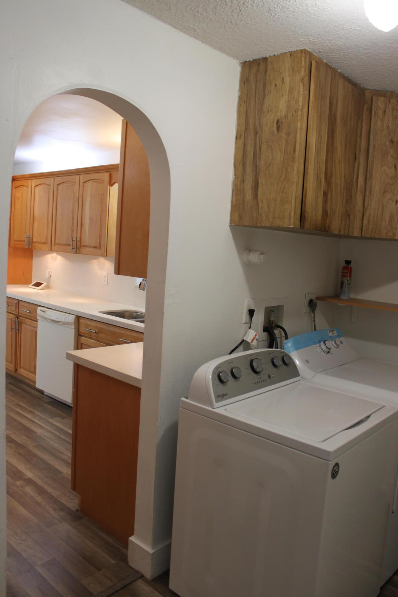 3240 Southwest 4th Street Deerfield Beach, FL 33442 - Photo 19 of 28 a kitchen with a sink cabinets and stainless steel appliances