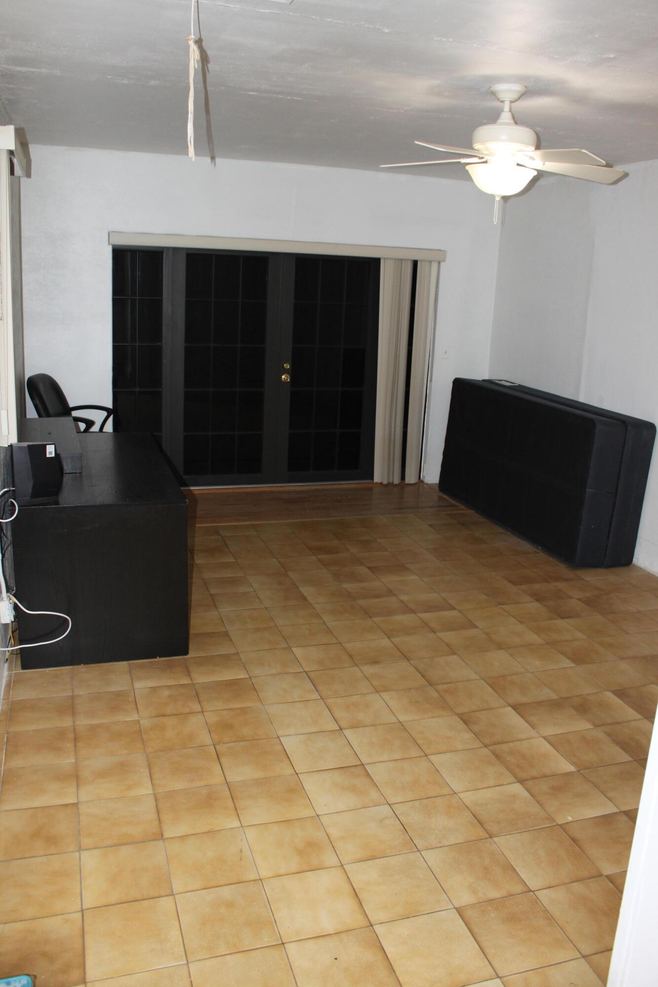 3240 Southwest 4th Street Deerfield Beach, FL 33442 - Photo 20 of 28 a bedroom with a bed and a dresser