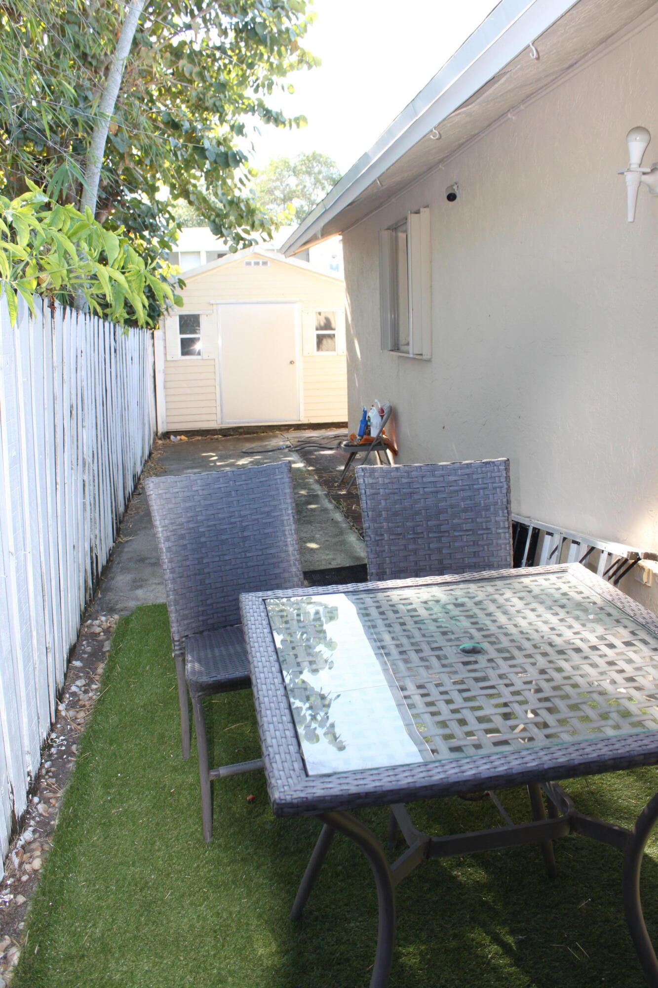 3240 Southwest 4th Street Deerfield Beach, FL 33442 - Photo 22 of 28 a outdoor dining space with furniture and wooden floor