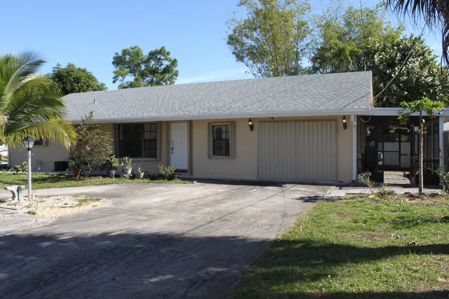 a house with yard in front of it