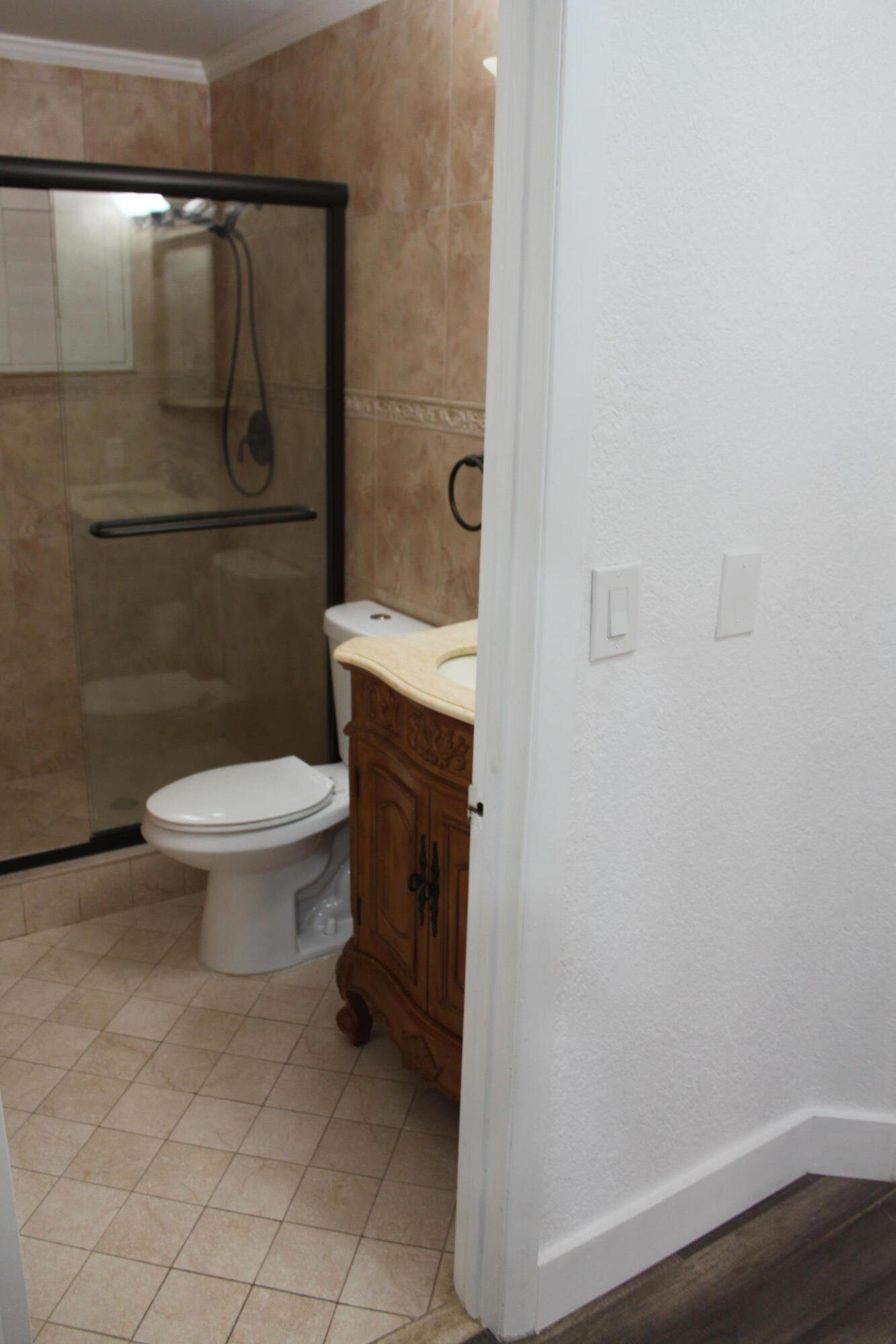 3240 Southwest 4th Street Deerfield Beach, FL 33442 - Photo 5 of 28 a bathroom with a toilet and a shower