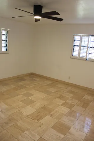 an empty room with windows