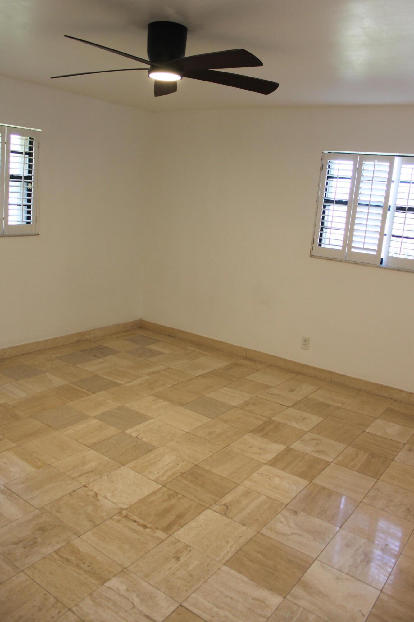 3240 Southwest 4th Street Deerfield Beach, FL 33442 - Photo 7 of 28 an empty room with windows