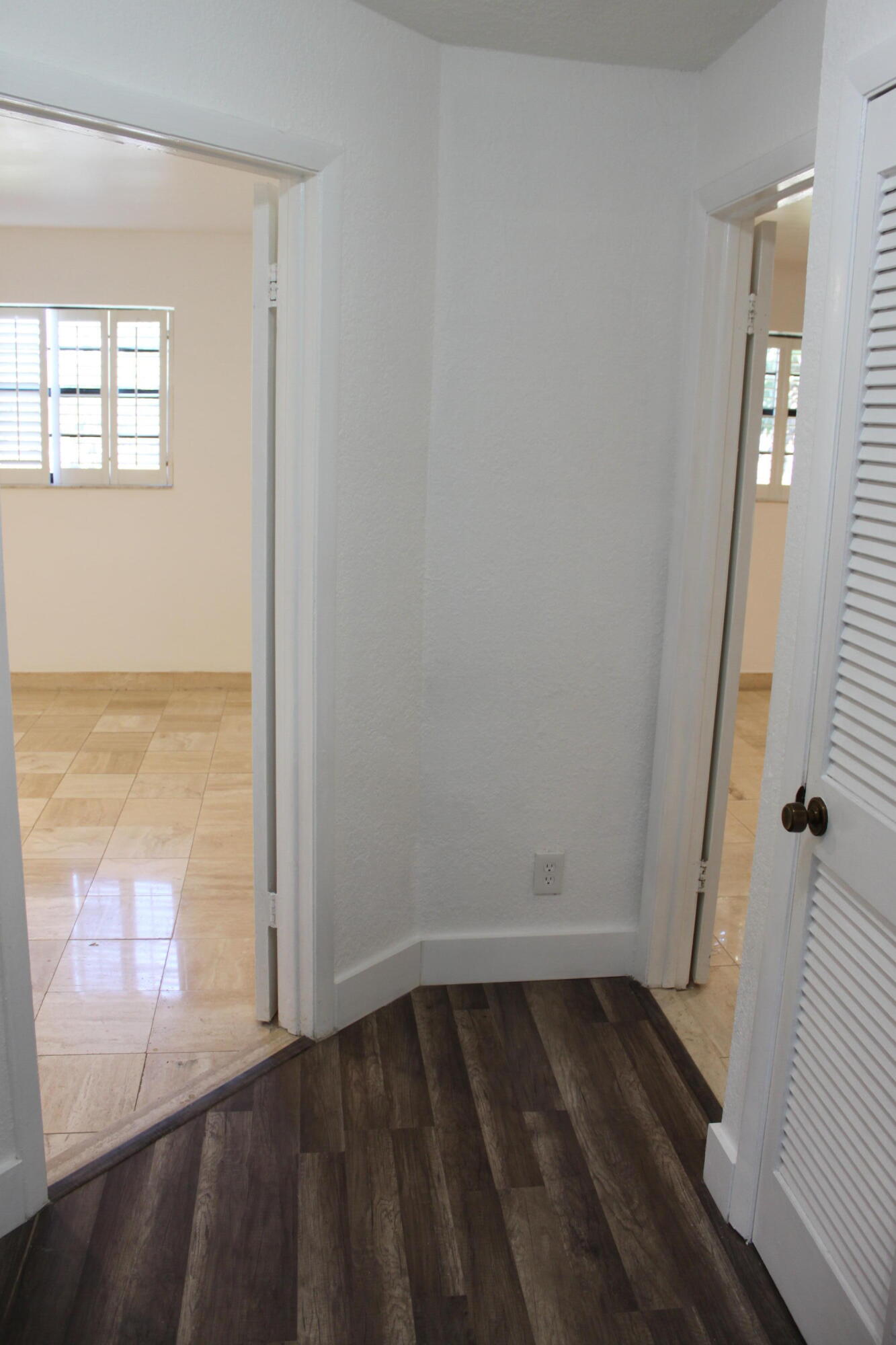 3240 Southwest 4th Street Deerfield Beach, FL 33442 - Photo 8 of 28 an empty room with wooden floor and windows