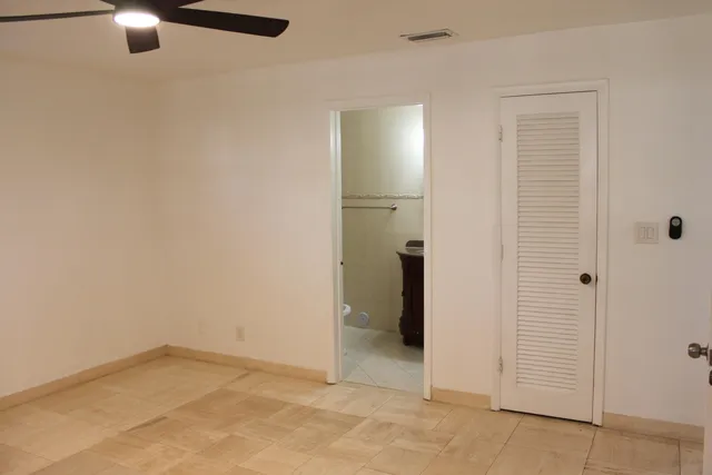 an empty room with closet