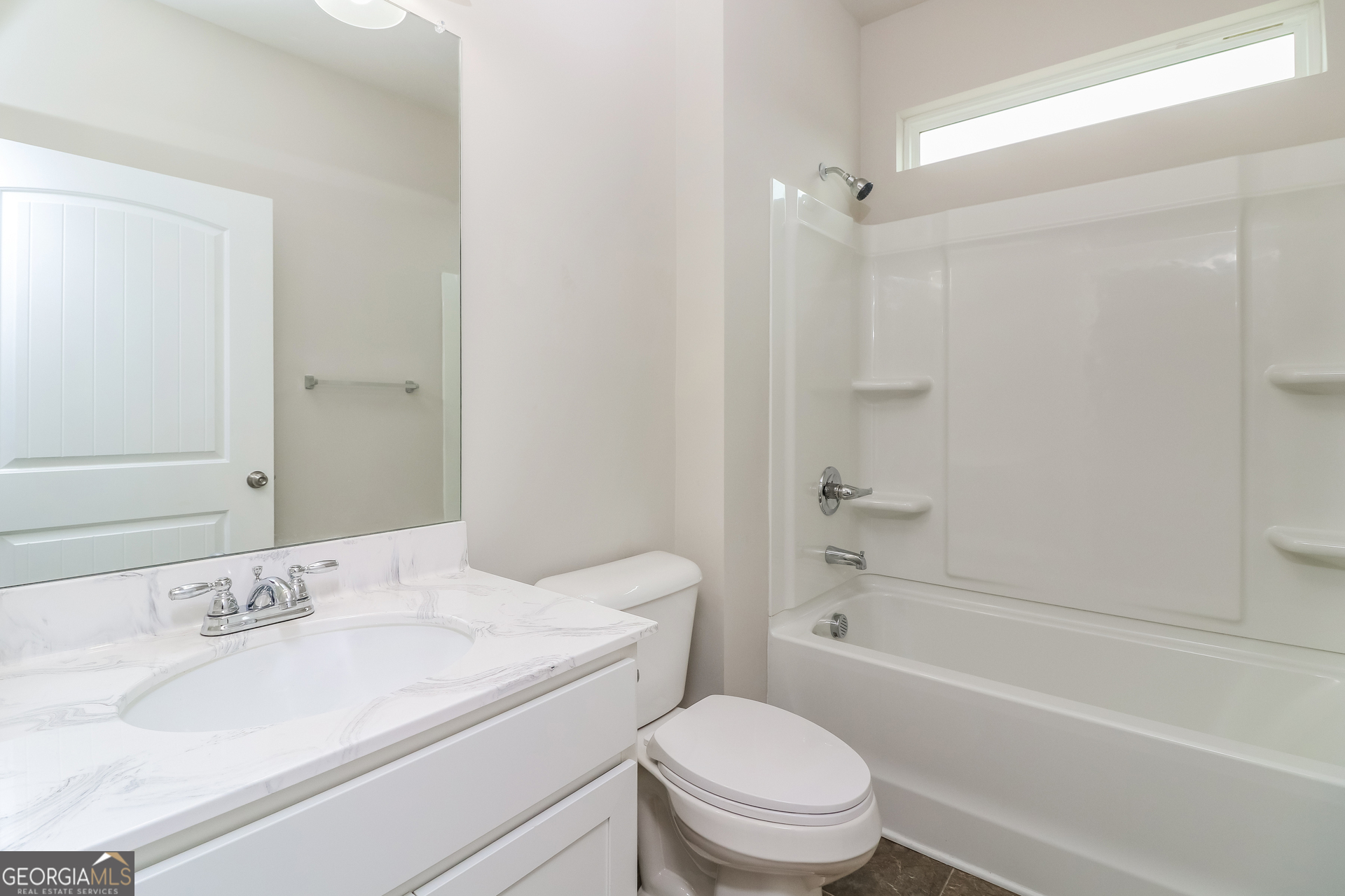 13 Applewood Drive Northeast Rome, GA 30165 - Photo 17 of 22 a bathroom with a sink toilet and shower