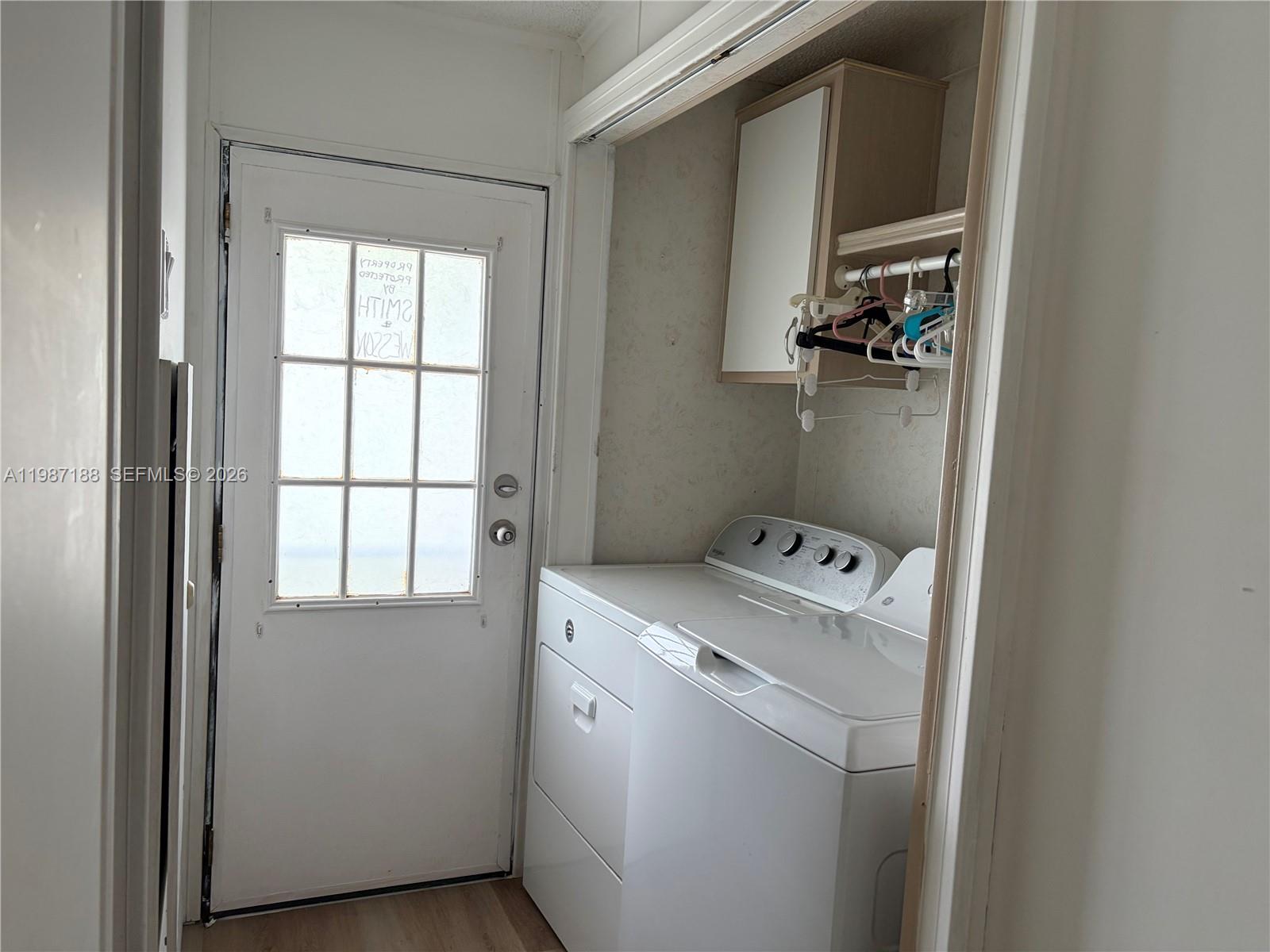 35303 Southwest 180th Avenue, Unit 391 Homestead, FL 33034 - Photo 19 of 23 a utility room with dryer and washer