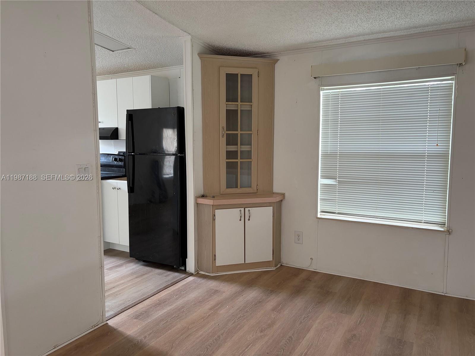 35303 Southwest 180th Avenue, Unit 391 Homestead, FL 33034 - Photo 21 of 23 an empty room with closet and wooden floor