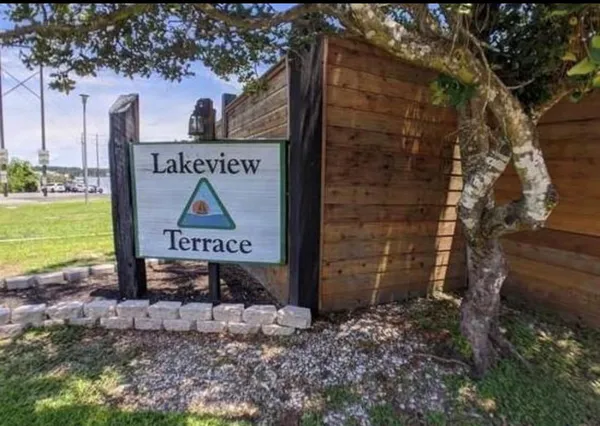 a sign on the side of the road