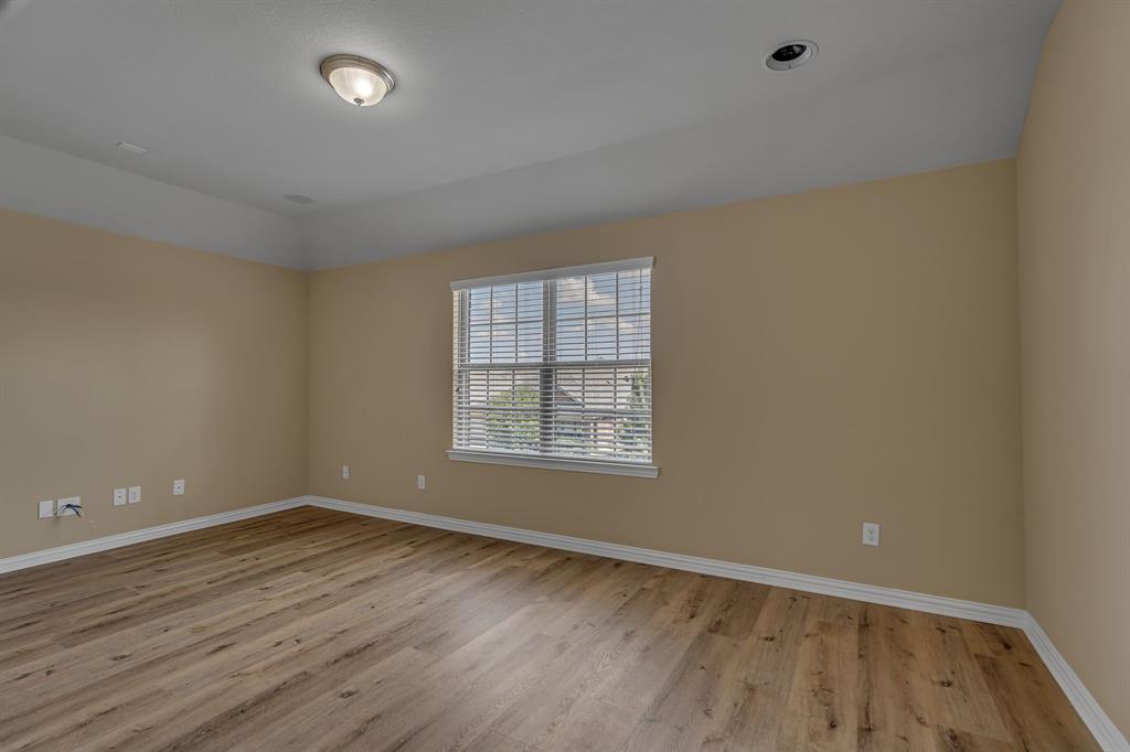 3812 Fordham Street Frisco, TX 75036 - Photo 24 of 33 Empty room featuring light wood-style flooring