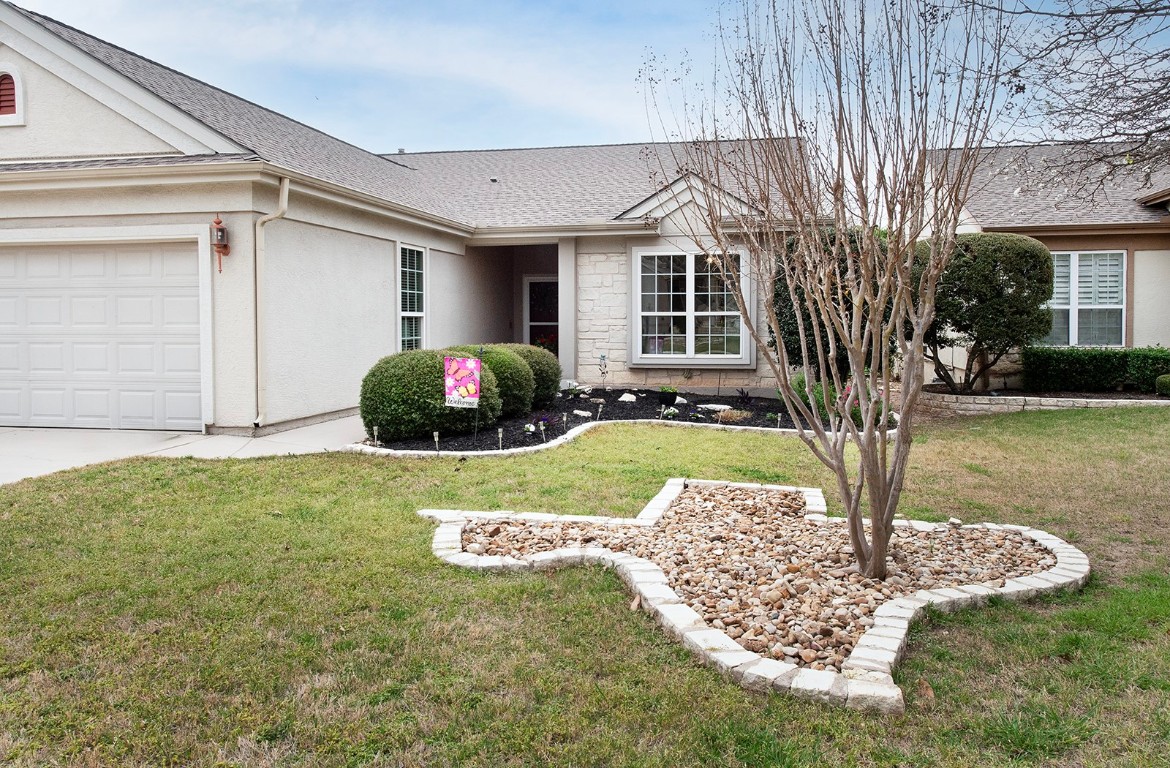 Come see this lovely centrally located Sun City home at 103 Silver Bonnet --a Cambridge floor plan with attractive Texas-style landscaping and no steps for entry! It's just moments away from Mulligans, Cowan Creek Golf Club and Legacy Golf Club.