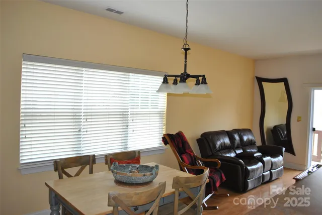 a workspace with furniture and window