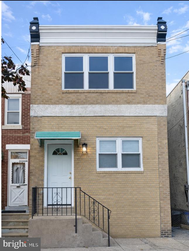 4564 Bermuda Street Philadelphia, PA 19124 - Photo 2 of 8 a building view with a brick wall
