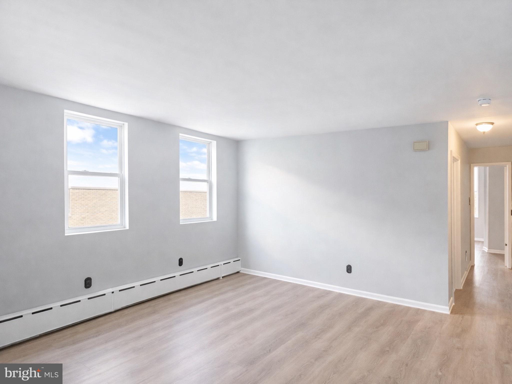 4564 Bermuda Street Philadelphia, PA 19124 - Photo 4 of 8 an empty room with a window