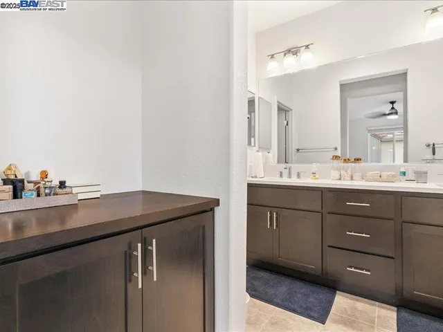 a bathroom with a shower and a bath tub