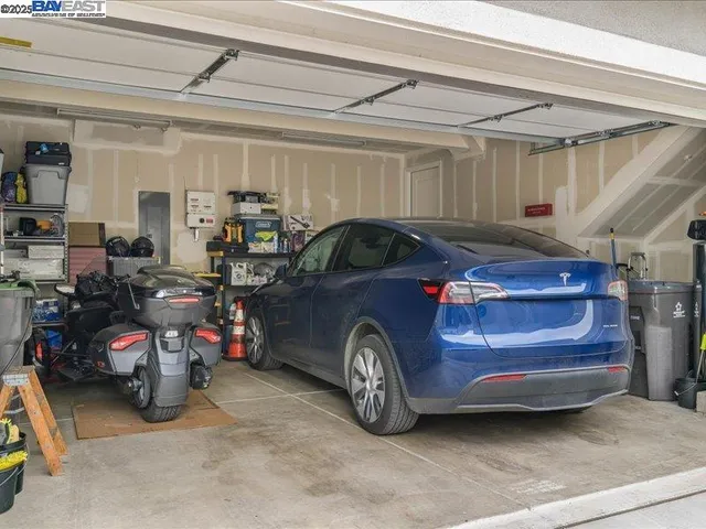 an aerial view of a house with a ocean view