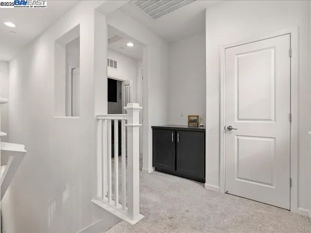 a view of storage and utility room with washer and dryer