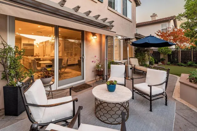 a outdoor space with patio the couches and a dining table with the garden view
