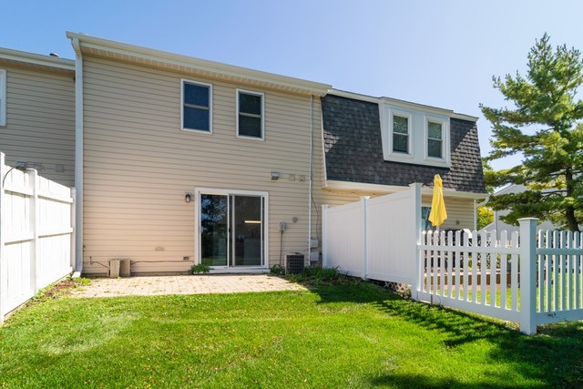 204 Rodenburg Road Roselle, IL 60172 - Photo 11 of 12 a view of a house with backyard and porch