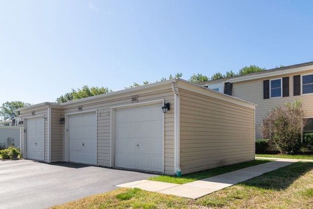 204 Rodenburg Road Roselle, IL 60172 - Photo 10 of 12 a view of a house with a backyard