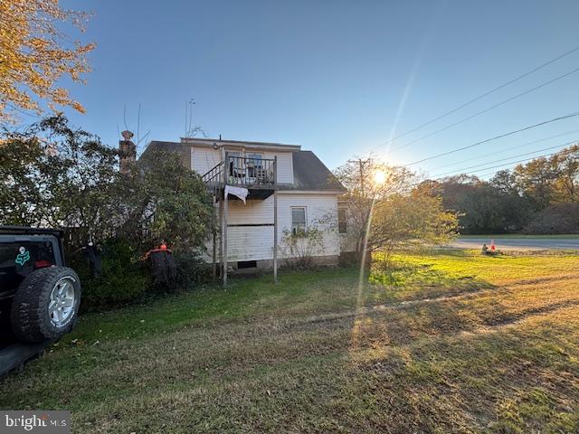 22314 Pot Pie Road Wittman, MD 21676 - Photo 13 of 14 a view of a house with backyard and swimming pool