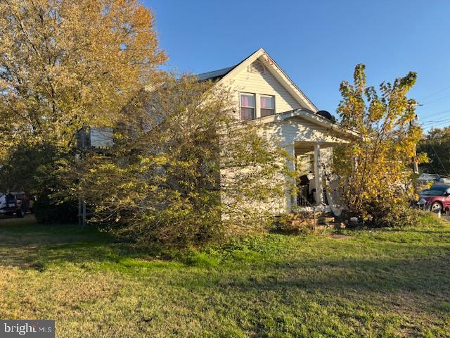 22314 Pot Pie Road Wittman, MD 21676 - Photo 10 of 14 a view of a house with a yard