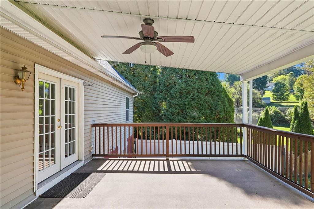 2430 Coulterville Road Irwin, PA 15642 - Photo 18 of 34 a view of a balcony with furniture