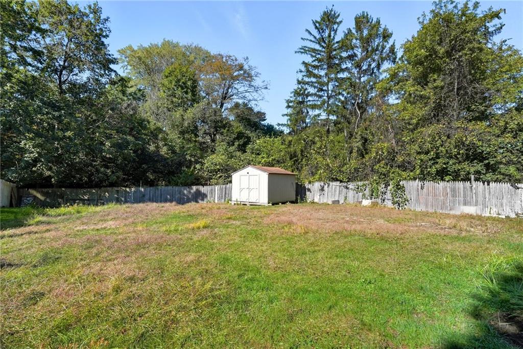 2430 Coulterville Road Irwin, PA 15642 - Photo 32 of 34 a backyard of a house with lots of green space