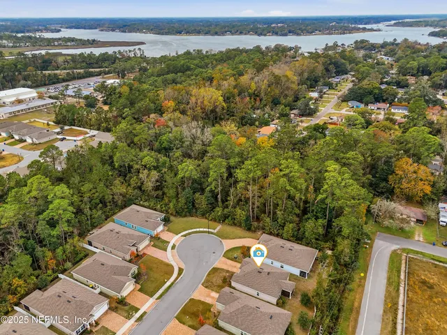 an aerial view of a city with lots of residential buildings