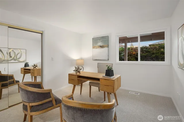 a living room with furniture and window