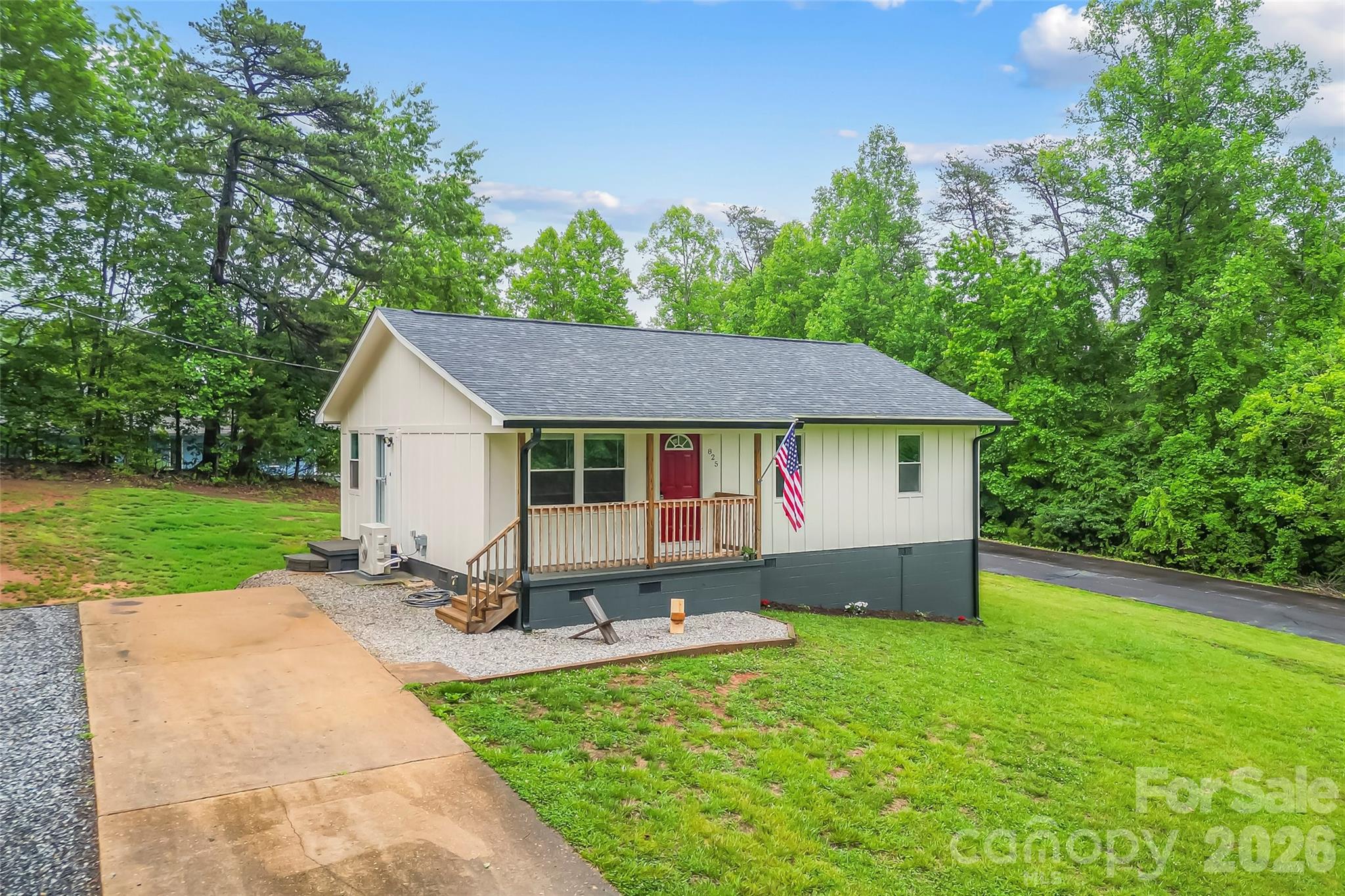 825 South Creek Road Nebo, NC 28761 - Photo 33 of 34 a front view of a house with a yard and green space