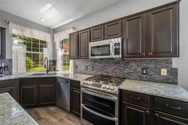 $499,999 | 7305 Meadowwood Drive, Rowlett, TX 75089