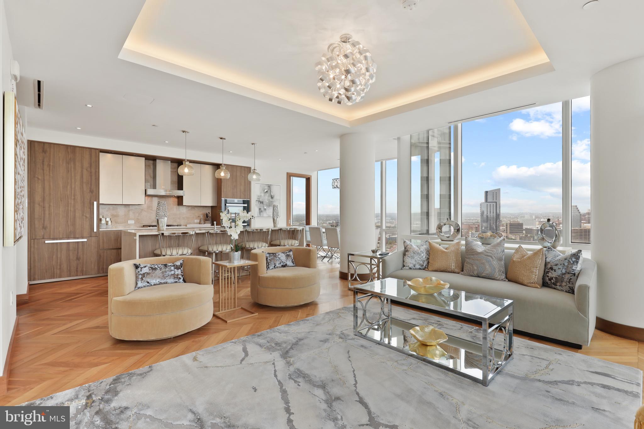 300 International Drive, Unit 2403 Baltimore, MD 21202 - Photo 2 of 36 a living room with furniture and a large window