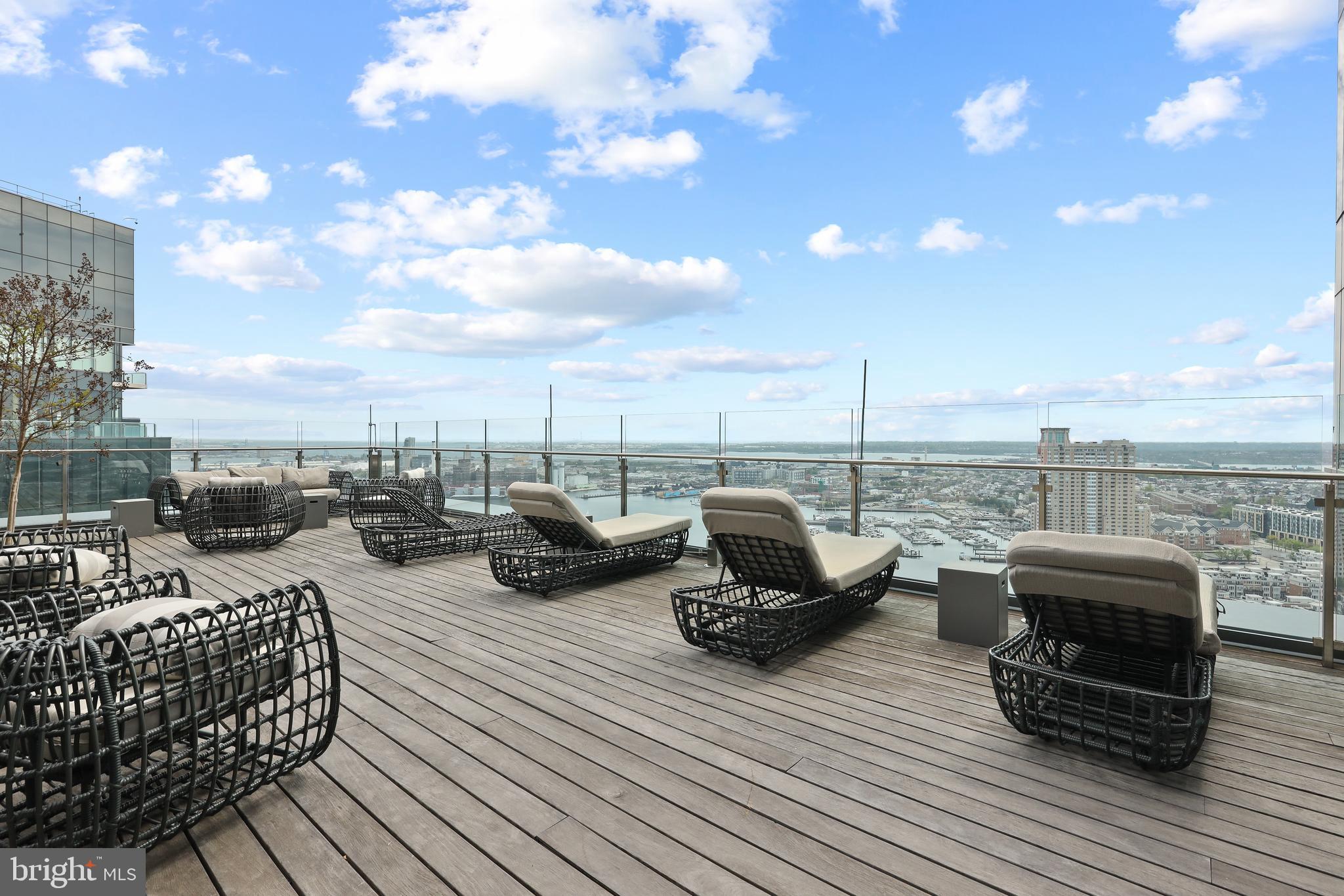 300 International Drive, Unit 2403 Baltimore, MD 21202 - Photo 33 of 36 a view of a terrace with seating space